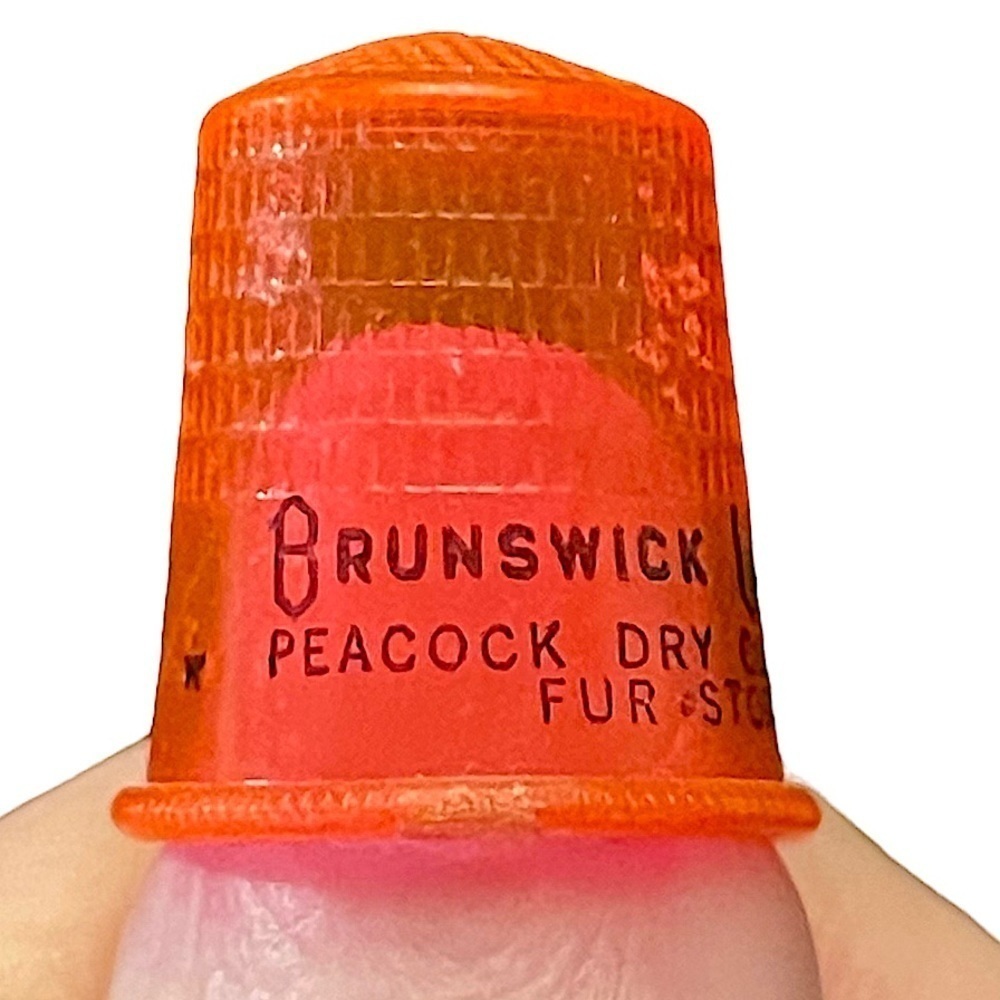 VINTAGE Brunswick Laundry Jersey City Orange Plastic Advertising Thimble